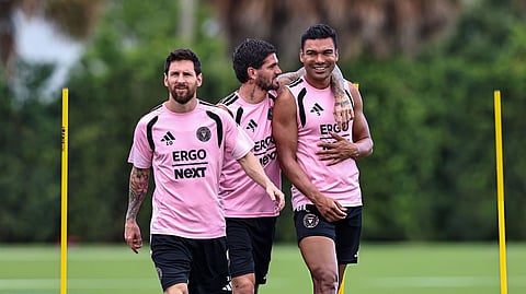 Inter Miami's Lionel Messi (L), Rodrigo De Paul and Casemiro (R).