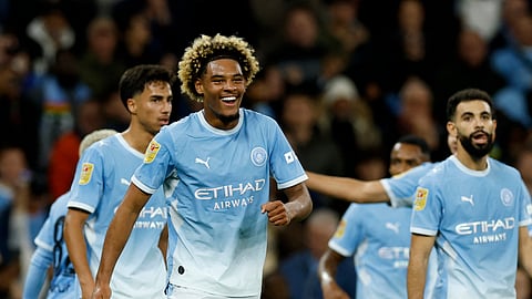 Manchester City's Floyd Samba celebrates scoring their first goal.
