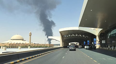 Large plume of black smoke rises from the fuel storage depot at King Khalid International Airport, in Riyadh, Saudi Arabia, September 19, 2026. Picture taken with a mobile phone. 
