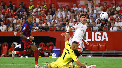Barcelona's Raphinha scores their third goal to complete his hat-trick.