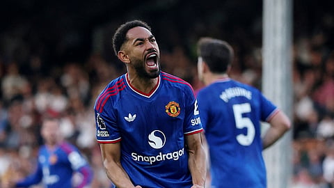 Manchester United's Matheus Cunha celebrates scoring their first goal.