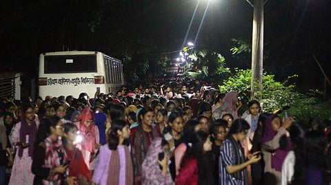 Students protest the decision to replace the vice-chancellor on Monday night.