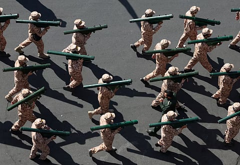 Members of Iranian militia forces (Basij) attend a military march in Tehran, Iran, September 18, 2026.