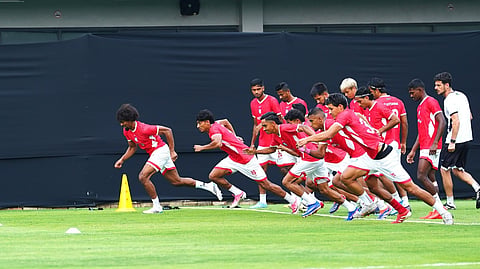 Hamza Choudhury leads a training drill during the Bangladesh football team's practice session in Jakarta on Tuesday.