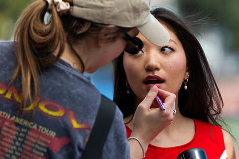 Actor Isabel Feldman has some make-up applied during the filming of a CandyJar microdrama at a high school in Los Angeles, California, U.S. July 7, 2026. 