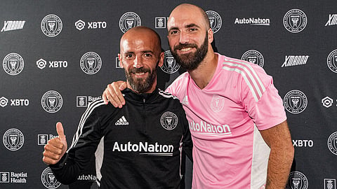 Former Argentina international Gonzalo Higuain (R) with his brother former Colombus Crew coach Federico Higuain.