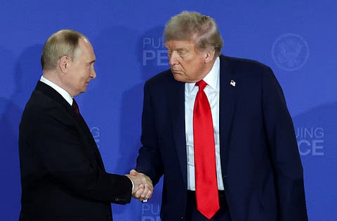 US President Donald Trump and Russian President Vladimir Putin shake hands during a press conference following their meeting to negotiate an end to the war in Ukraine, at Joint Base Elmendorf-Richardson in Anchorage, Alaska, US, August 15, 2025.
