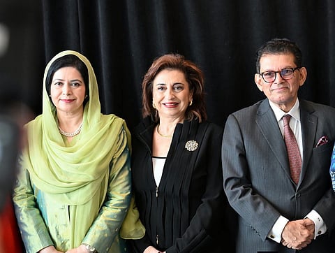 Zubaida Rahman and Khalilur Rahman pose for a photograph with UN Women's Executive Director Sima Sami Bahous during the event.