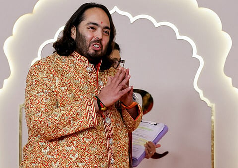 Groom Anant Ambani gestures on the day of his wedding with Radhika Merchant in Mumbai, India, July 12, 2024