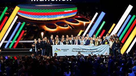 German Olympic Committee members pose during a press conference announcing Germany’s Olympic and Paralympic bid in Baden-Baden, Germany, on September 26, 2026.