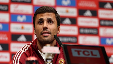 Spain's Rodri speaks during a press conference at Wembley Stadium in London.