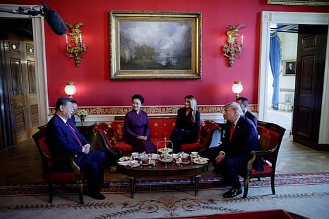 US President Donald Trump and first lady Melania Trump participate in tea with Chinese President Xi Jinping and his wife, Peng Liyuan, in the Red Room of the White House in Washington, DC, US, September 25, 2026.