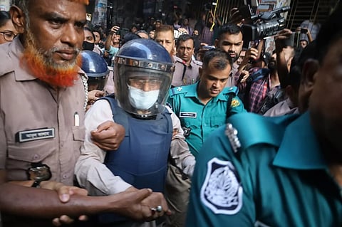 The file photo shows Satkhira-4 lawmaker Gazi Mohammad Nazrul Islam being taken to court in Dhaka.