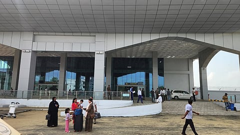 Passengers wait outside the newly-built terminal in Cox's Bazar International Airport.