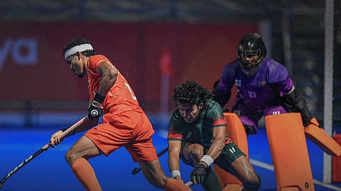 An action image from Bangladesh's group-stage match against India at the men's hockey event in the Asian Games 2026 in Nagoya, Japan on Monday.