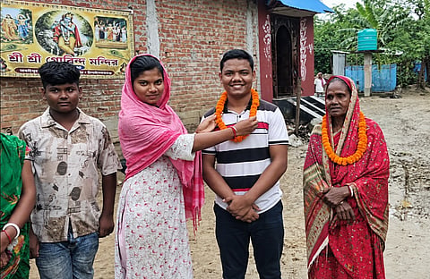 Villagers in Madhai, a village in Gomastapur upazila of Chapainawabganj gave garland to Kajal