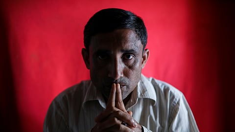 Mohib Ullah poses for a potrait at his office in Kutupalong refugee camp in Ukhiya, Cox’s Bazar, Bangladesh, April 19, 2018. 