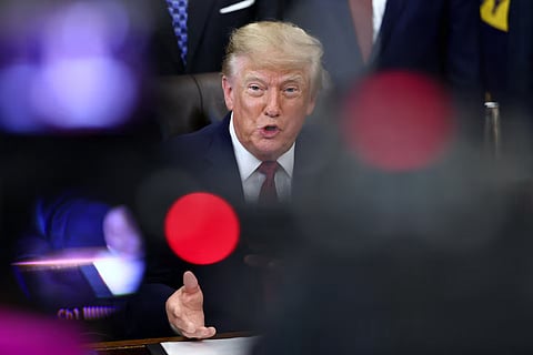 US President Donald Trump speaks in the Oval Office at the White House in Washington, DC, US, September 30, 2026.