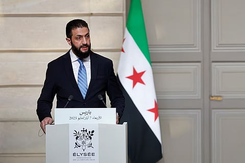 Syrian President Ahmed al-Sharaa speaks during a joint press conference with French President Emmanuel Macron after a meeting at the Elysee Palace in Paris, France, May 7, 2025