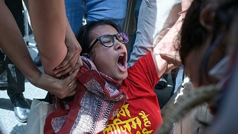 Delhi Police detain protesters from various organisations who were staging a demonstration near Jantar Mantar against Chief Election Commissioner Gyanesh Kumar.