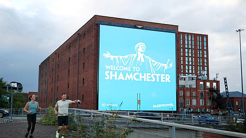 A Paddy Power billboard reading “WELCOME TO SHAMCHESTER” following Manchester City’s reported guilty verdict in their financial regulations case.