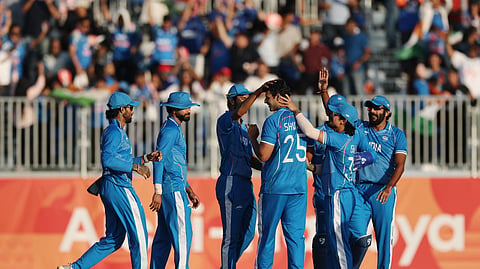 India's Shivam Dube celebrates with teammates after dismissing Pakistan's Saim Ayub, caught by Washington Sundar, during the men's cricket gold-medal match at the Asian Games.