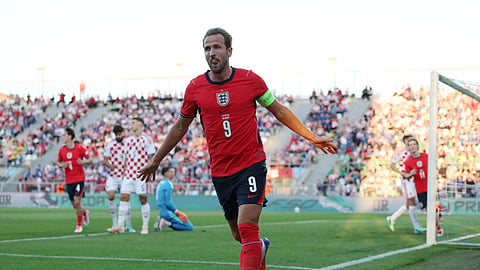 England's Harry Kane celebrates scoring their first goal.