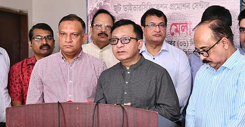 Textile and Jute Minister Khandakar Abdul Muktadir speaks to reporters at an event in Tejgaon.