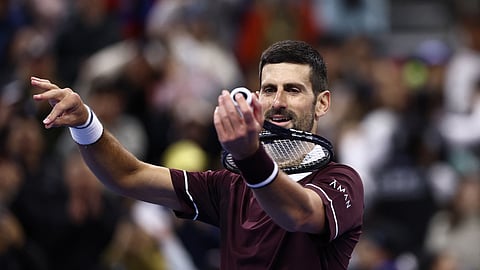 Novak Djokovic of Serbia celebrates after beating Germany’s Alexander Zverev in their China Open quarter-final in Beijing, China.