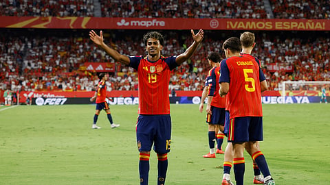 Spain's Lamine Yamal celebrates scoring their first goal.