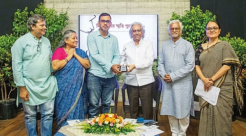 Cinematographer Barkat Hossain Polash received the Mishuk Munier Memorial Award 2026 for his work on Nakshi Kanthar Zamin at a ceremony held at Bengal Shilpalay in Dhanmondi on Saturday