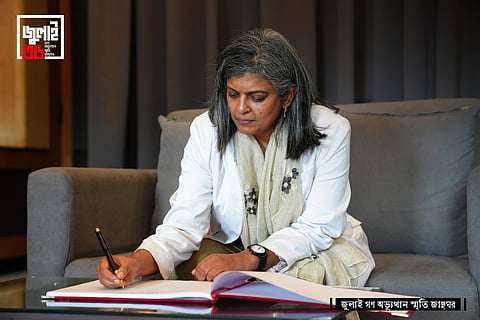 UK Labour MP Rupa Huq writes a note in the visitors’ book during her visit to the July Mass Uprising Memorial Museum in Dhaka on Sunday.