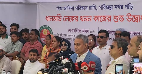Road Transport Minister Shaikh Rabiul Alam speaks after inaugurating the re-excavation work of Dhanmondi Lake in Dhaka on Tuesday.
