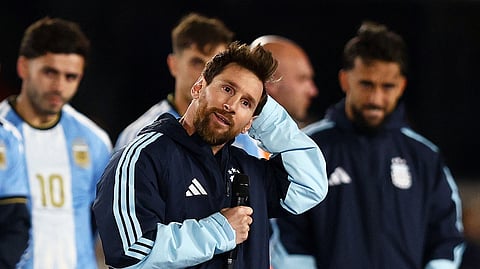 Argentina's Lionel Messi speaks to fans following his final international match.