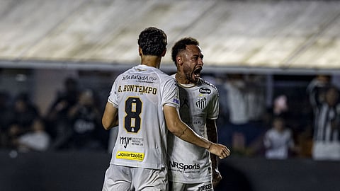 Neymar celebrates after scoring against Flamengo.