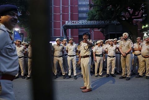 Security personnel stand guard outside the headquarters of the Election Commission of India on the day of a Cockroach Janta Party (CJP) protest seeking the resignation of India's Chief Election Commissioner, Gyanesh Kumar, in New Delhi, India, October 10, 2026.