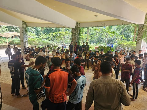 Students gather outside the vice-chancellor’s building at CUET on Monday after locking its gate, confining the newly appointed VC inside.