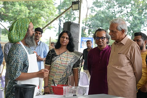 Cultural Affairs Minister Nitai Roy Chowdhury speaking to artists at an event organised by the July Mass Uprising Memorial Museum on its premises on October 12.