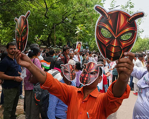 Supporters of the Cockroach Janta Party wear and display masks during a protest demonstration in New Delhi, India, on Jun 6, 2026.