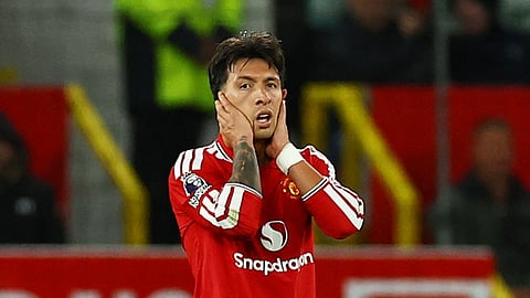 Manchester United's Lisandro Martinez looks dejected.