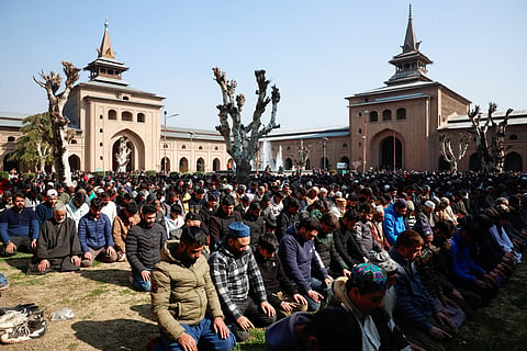 Kashmiri Muslim men offer prayers on the first Friday of the holy fasting month of Ramadan at Jamia Mosque in Srinagar, Indian Kashmir, February 20, 2026.