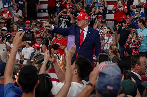 US President Donald Trump points as he leaves a campaign event in Dalton, Georgia, US October 16, 2026. 