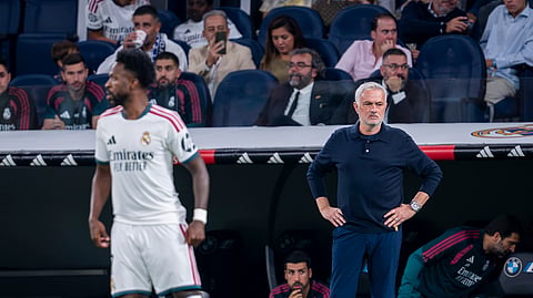 Real Madrid coach Jose Mourinho (R) stands near Vinicius Junior during their LaLiga match against Villarreal in Madrid on 10 October 2026.