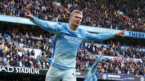 Manchester City's Erling Haaland celebrates scoring their third goal.