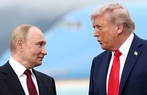 US President Donald Trump speaks with Russian President Vladimir Putin, as they meet to negotiate for an end to the war in Ukraine, at Joint Base Elmendorf-Richardson in Anchorage, Alaska, US, August 15, 2025. 