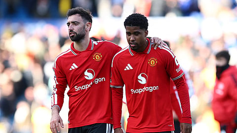 Manchester United's Bruno Fernandes and Andrey Santos at the end of the match.