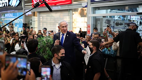 Israeli Prime Minister Benjamin Netanyahu meets members of the public, ahead of Israel’s national election, in Yokneam Illit, Israel, October 18, 2026.