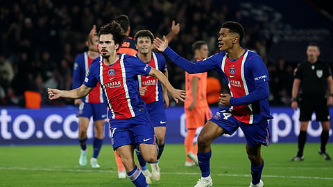 Paris St Germain's Vitinha celebrates scoring their third goal.