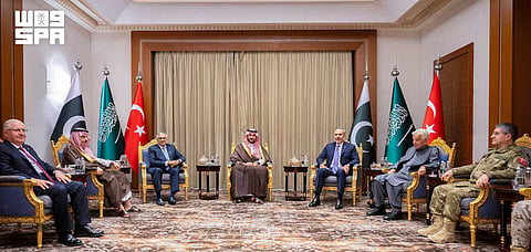 Turkey's Foreign Minister Hakan Fidan, Pakistan's Deputy Prime Minister and Foreign Minister Mohammad Ishaq Dar, Saudi Arabia's Foreign Minister Prince Faisal bin Farhan Al Saud, Turkey's Defence Minister Yasar Guler, Turkish Chief of General Staff General Selcuk Bayraktaroglu, Pakistan's Defence Minister Khawaja Muhammad Asif pose for a photo