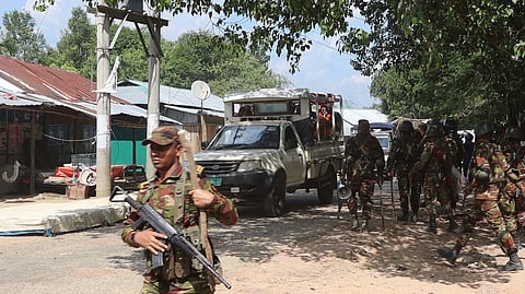 Army personnel take position in Sajek, Rangamati, amid an exchange of gunfire during a blockade on the tourist road on Thursday.